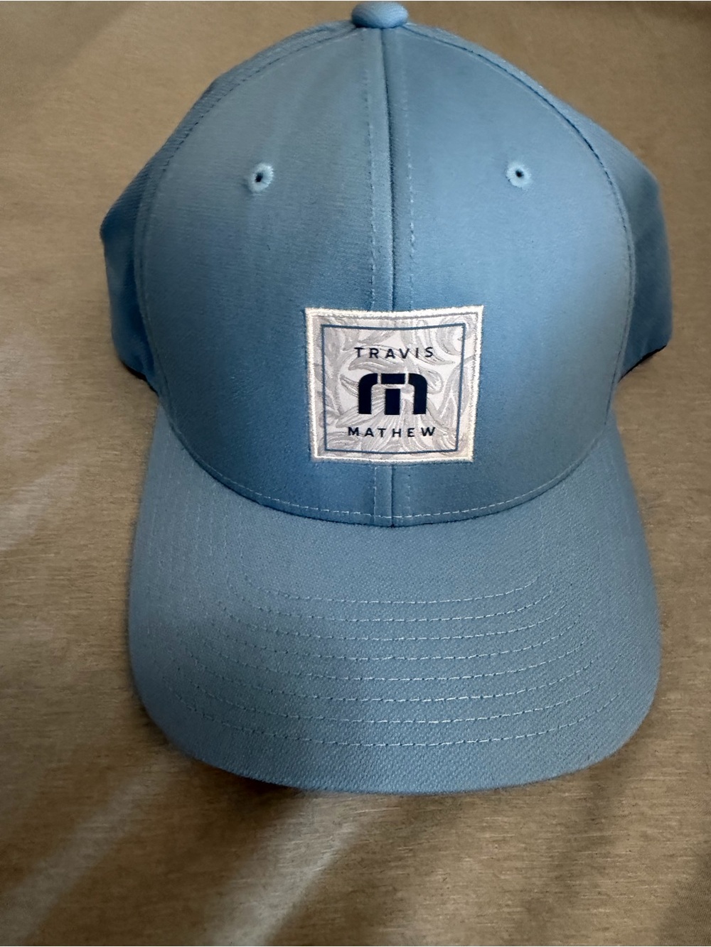 Travis Mathew Men’s Sky Blue Baseball Cap with Logo Patch